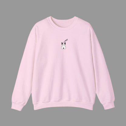 Pink sweatshirt with a small graphic on a white background