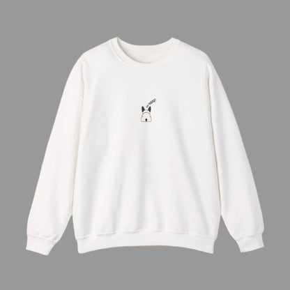 White sweatshirt with a small black graphic on a white background