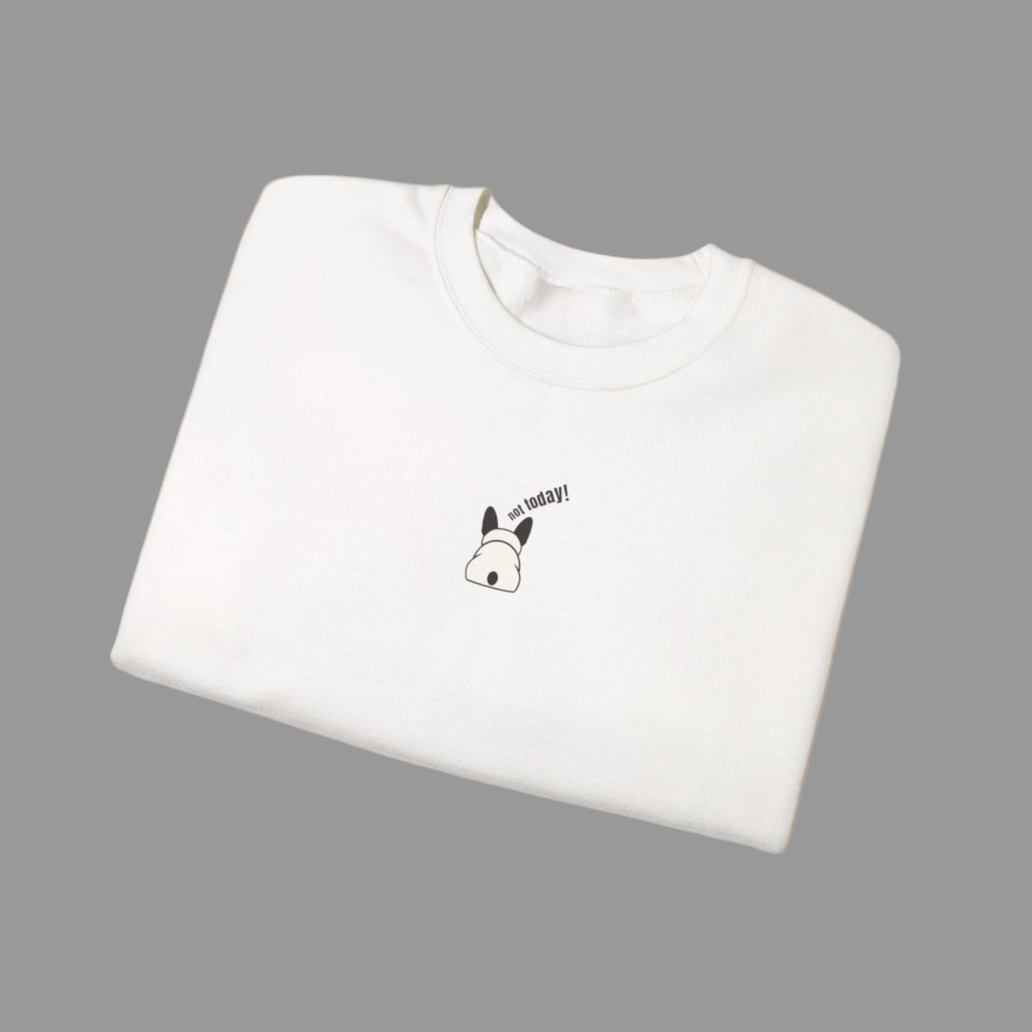 White t-shirt with a small graphic and text on a white background