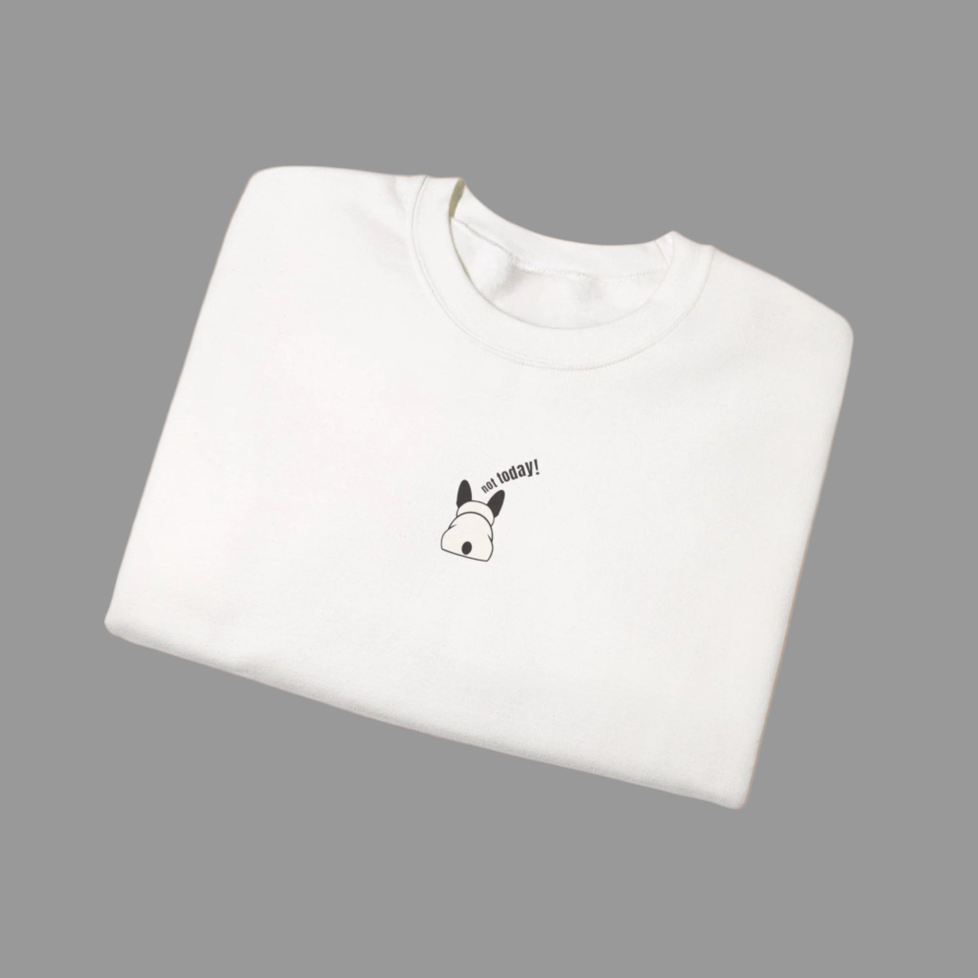 White t-shirt with a small graphic and text on a white background