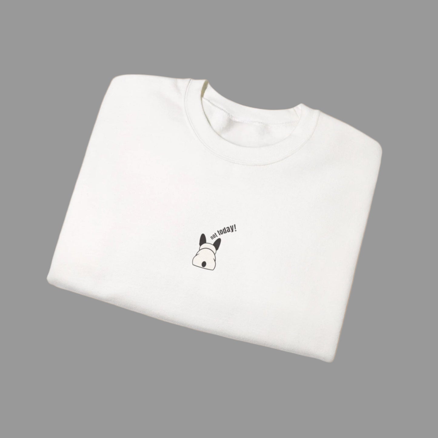 White sweatshirt with a small black and white design on a white background