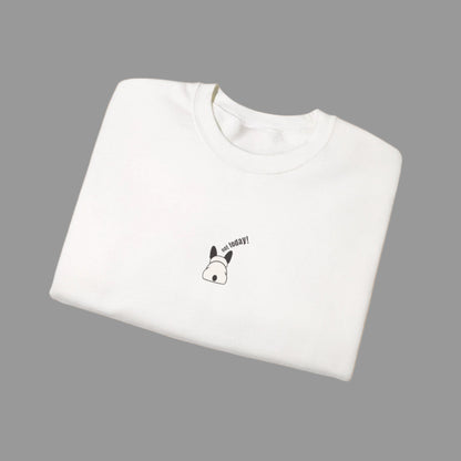 White sweatshirt with a small black and white design on a white background