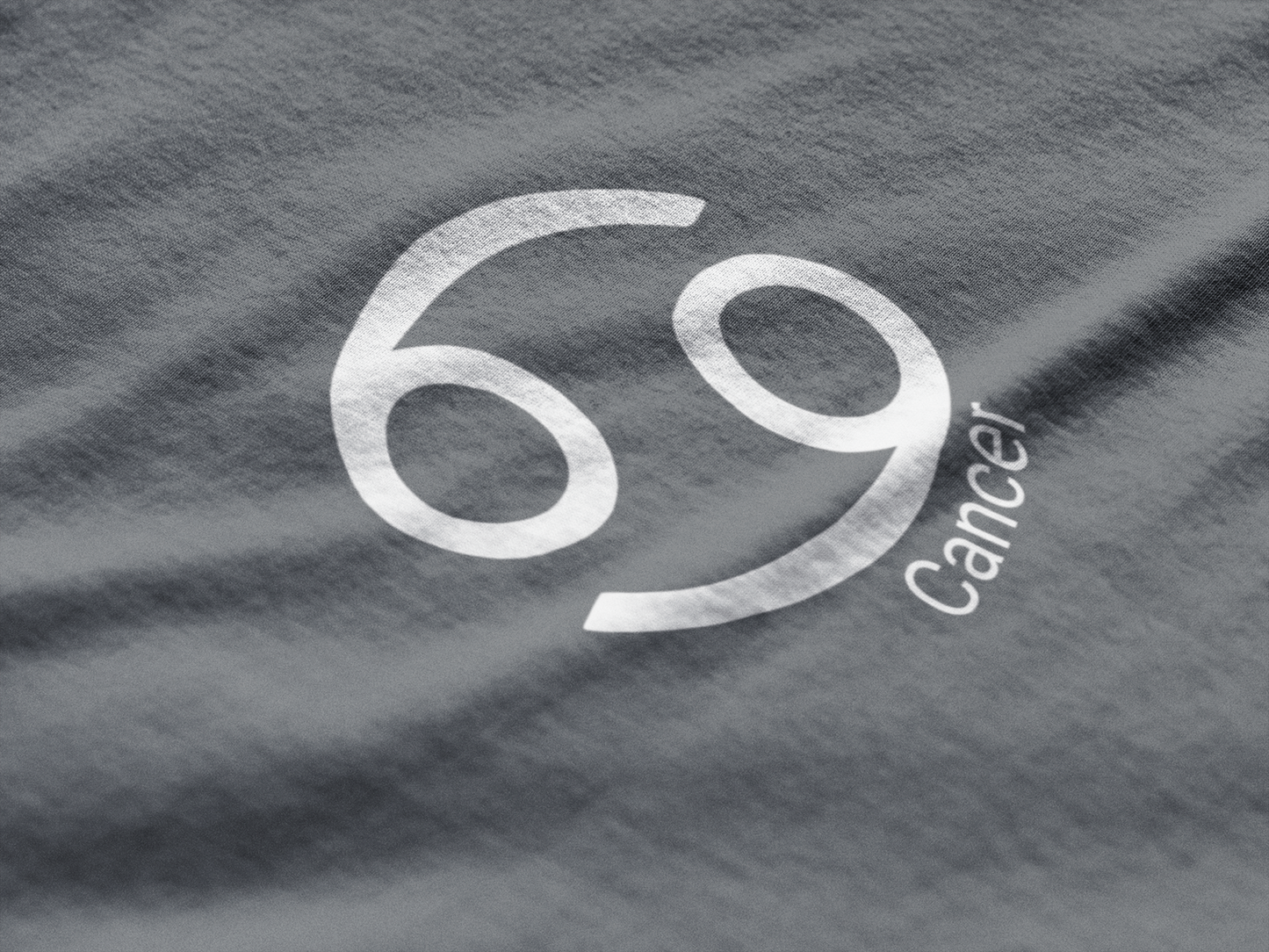 Gray t-shirt with '69 Cancer' printed in white on a textured fabric background