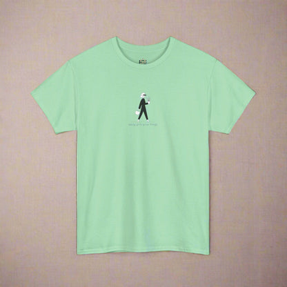 Light green t-shirt with a small graphic on a white background