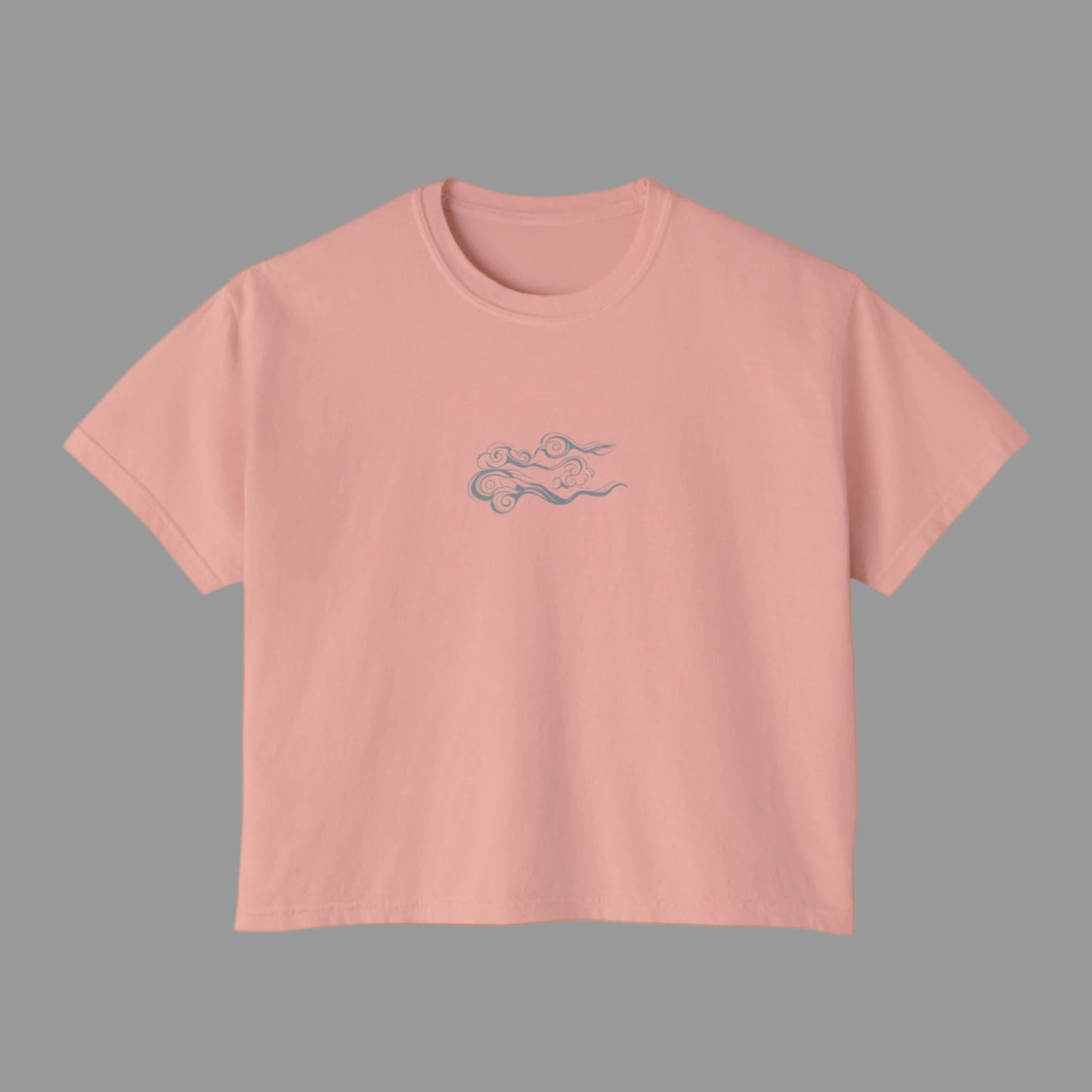 Pink t-shirt with a small design on a white background