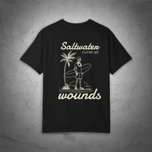 Black t-shirt with white graphic and text 'Saltwater cures all wounds' on a white background