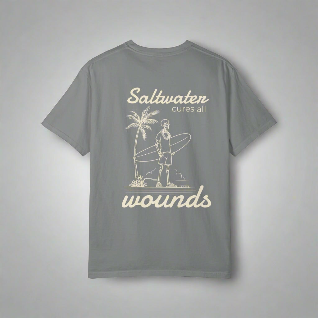 Gray t-shirt with a graphic and text 'Saltwater cures all wounds' on a white background
