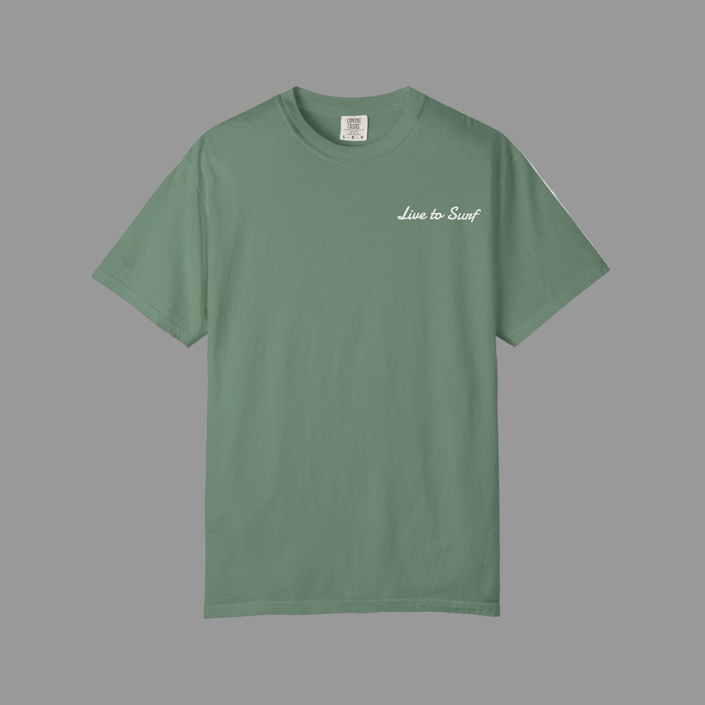 Green t-shirt with 'Live to Surf' text on a white background