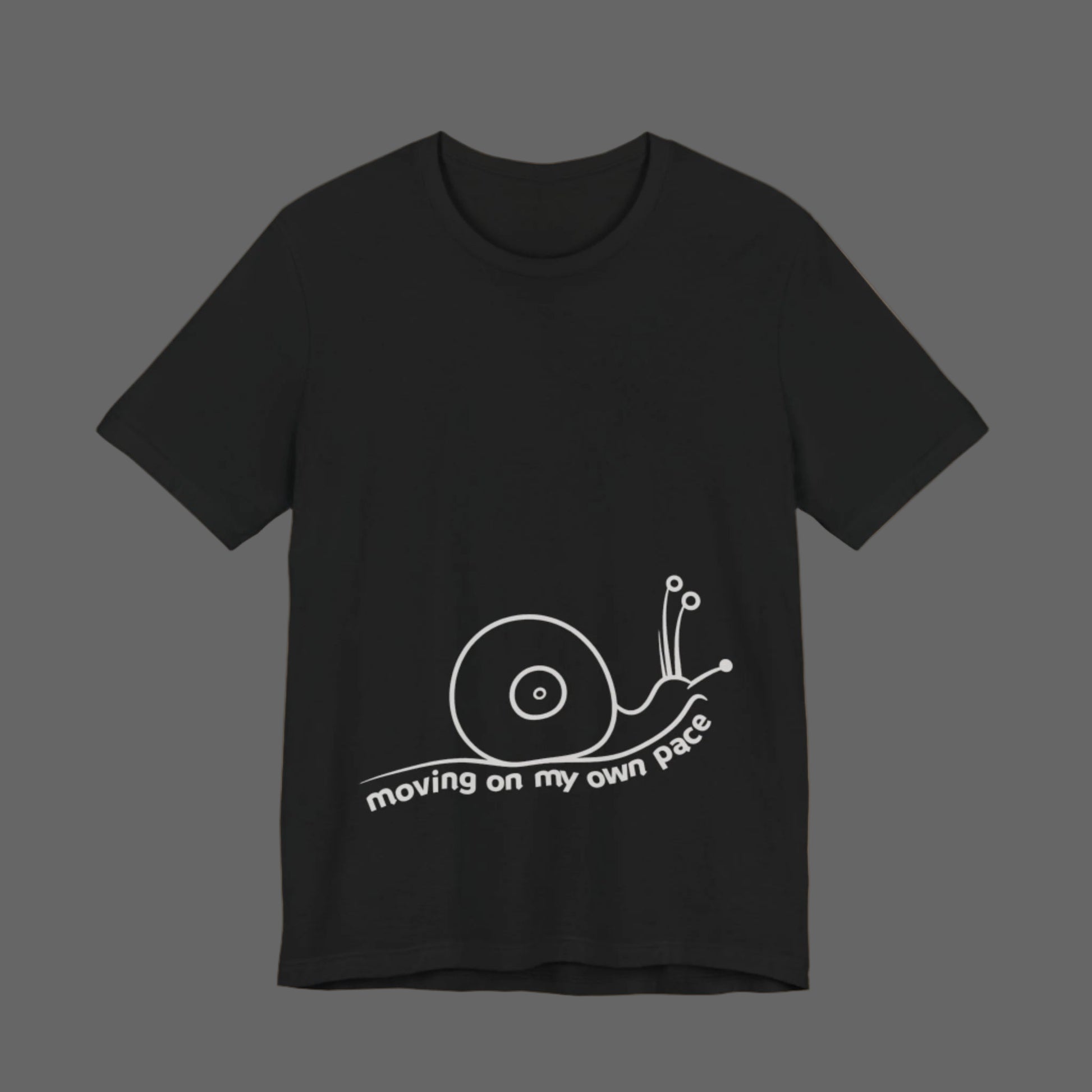 Black t-shirt with a white snail graphic and text on a white background