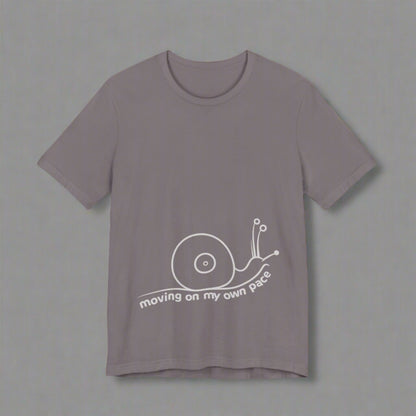 Gray t-shirt with a white snail graphic and text on a white background