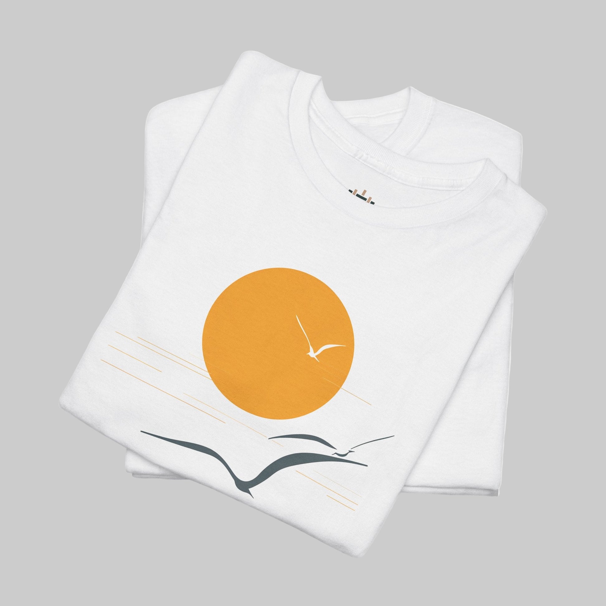 White t-shirt with a sun and bird design on a white background