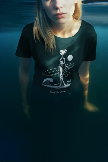 Person wearing a black t-shirt with a graphic design underwater
