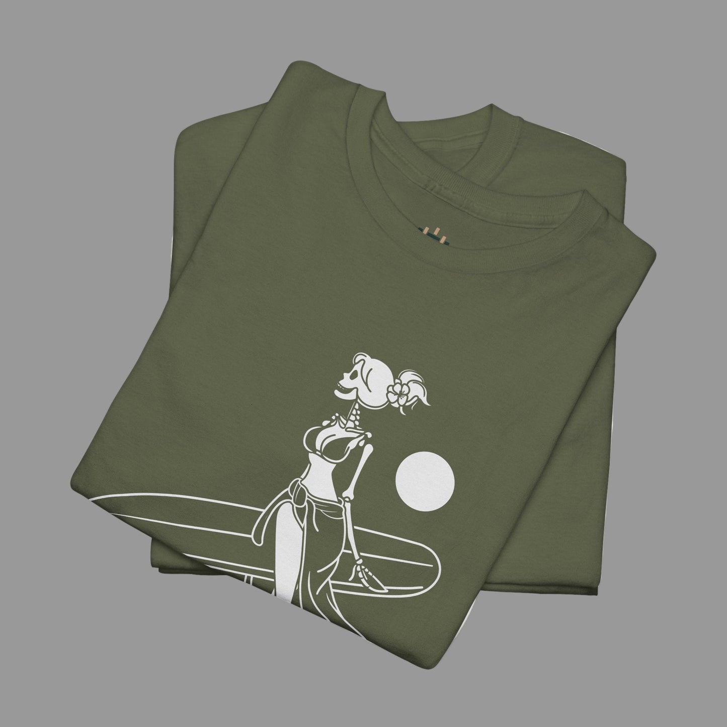 Folded green t-shirt with a white graphic design on a white background