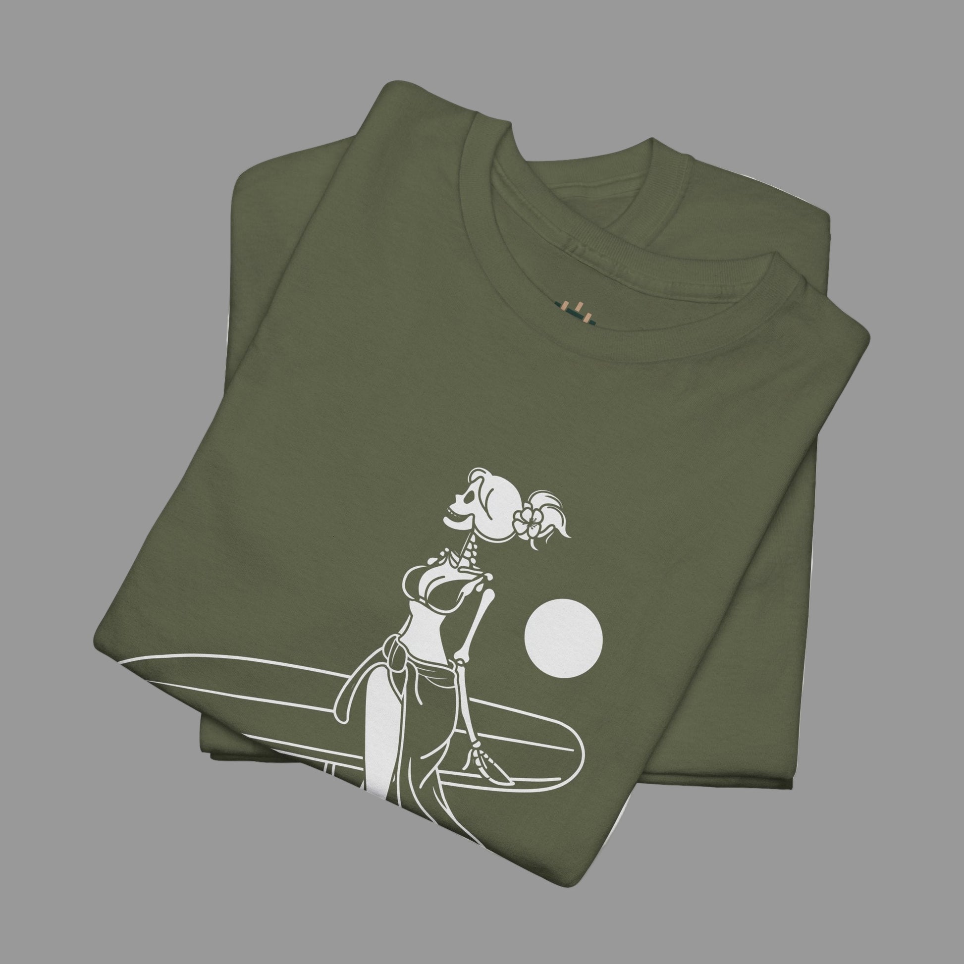 Folded green t-shirt with a white graphic design on a white background