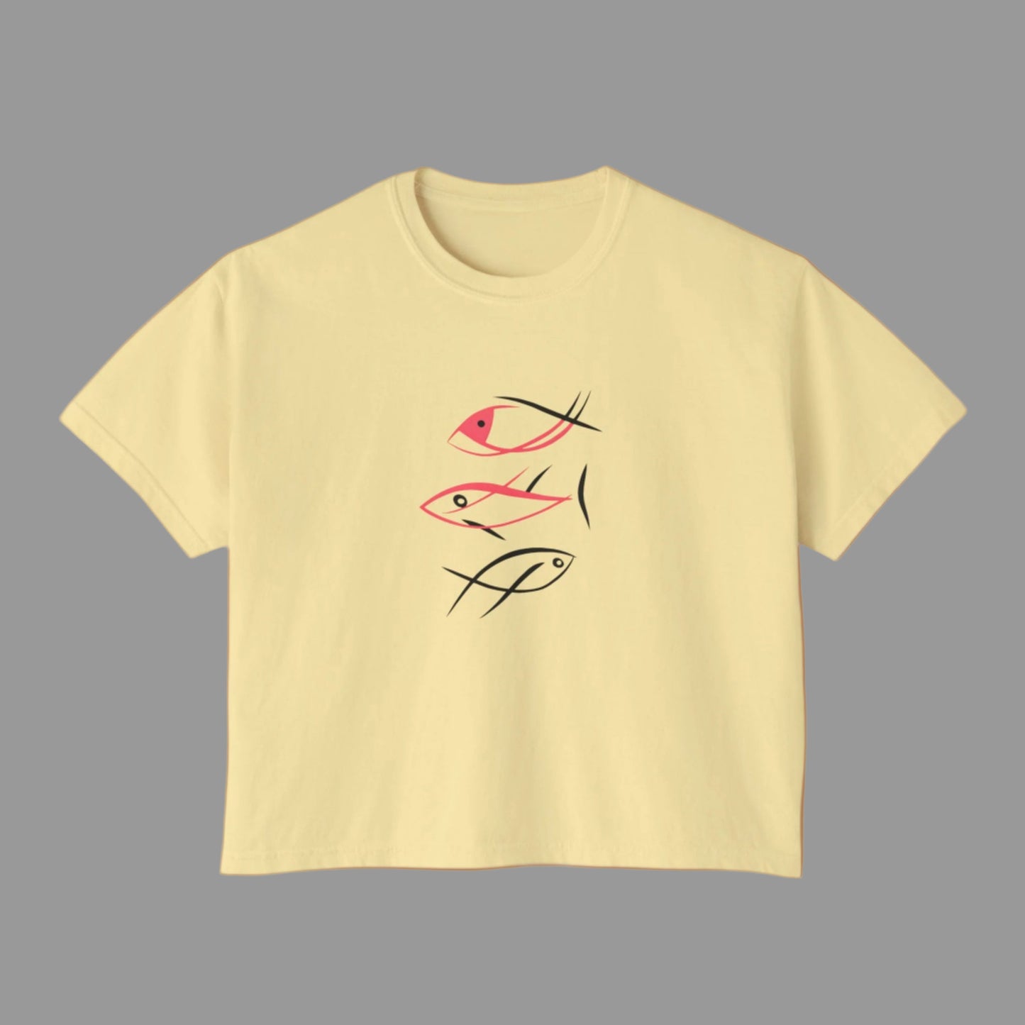 Yellow t-shirt with fish design on a white background