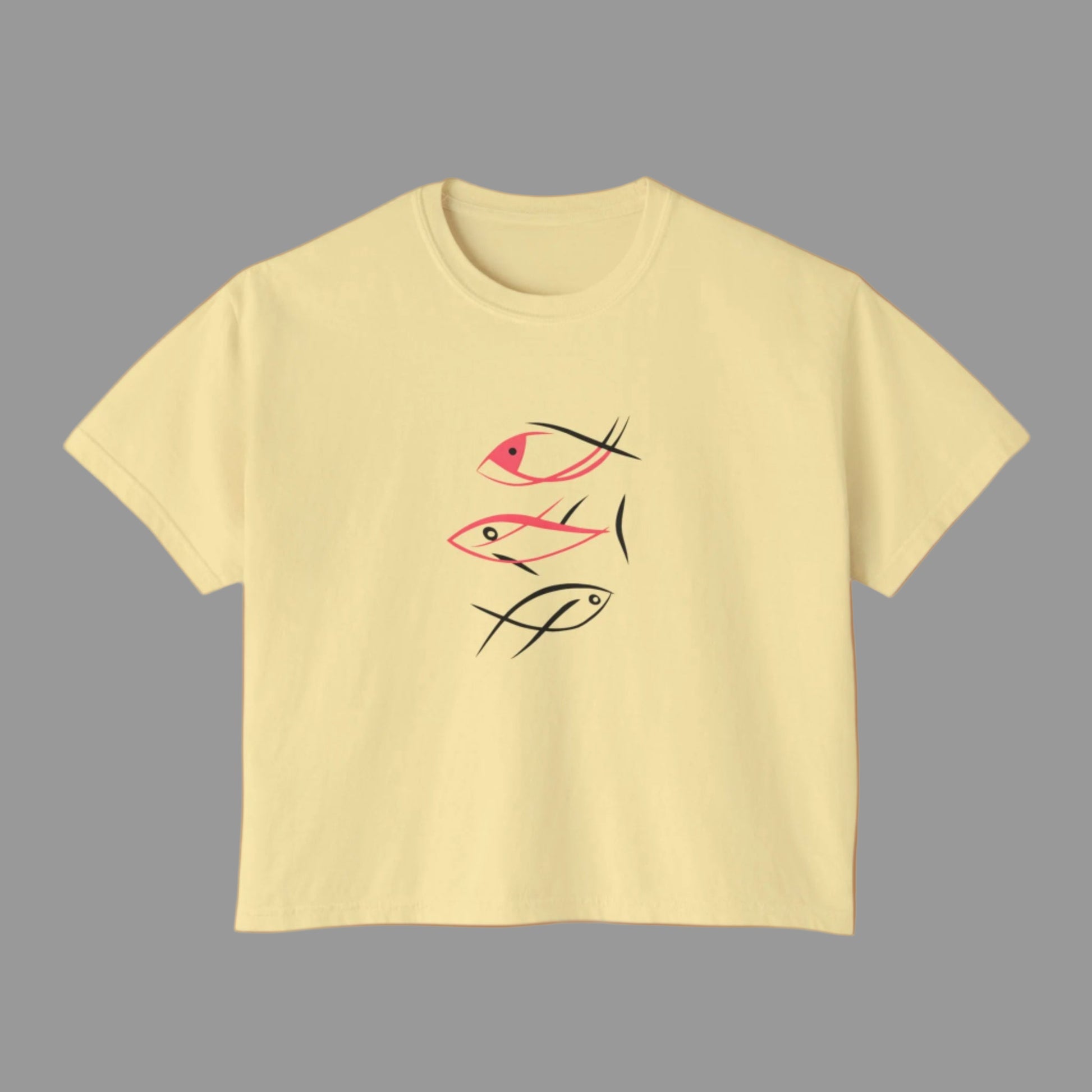 Yellow t-shirt with fish design on a white background