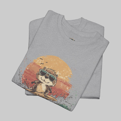 Folded gray t-shirt with a graphic of a bear wearing sunglasses and a sunset design on a white background.