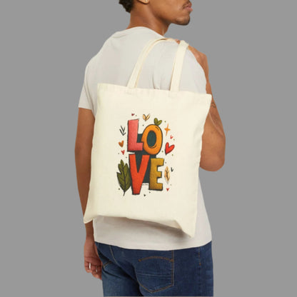 Man carrying a tote bag with 'LOVE' design on a white background