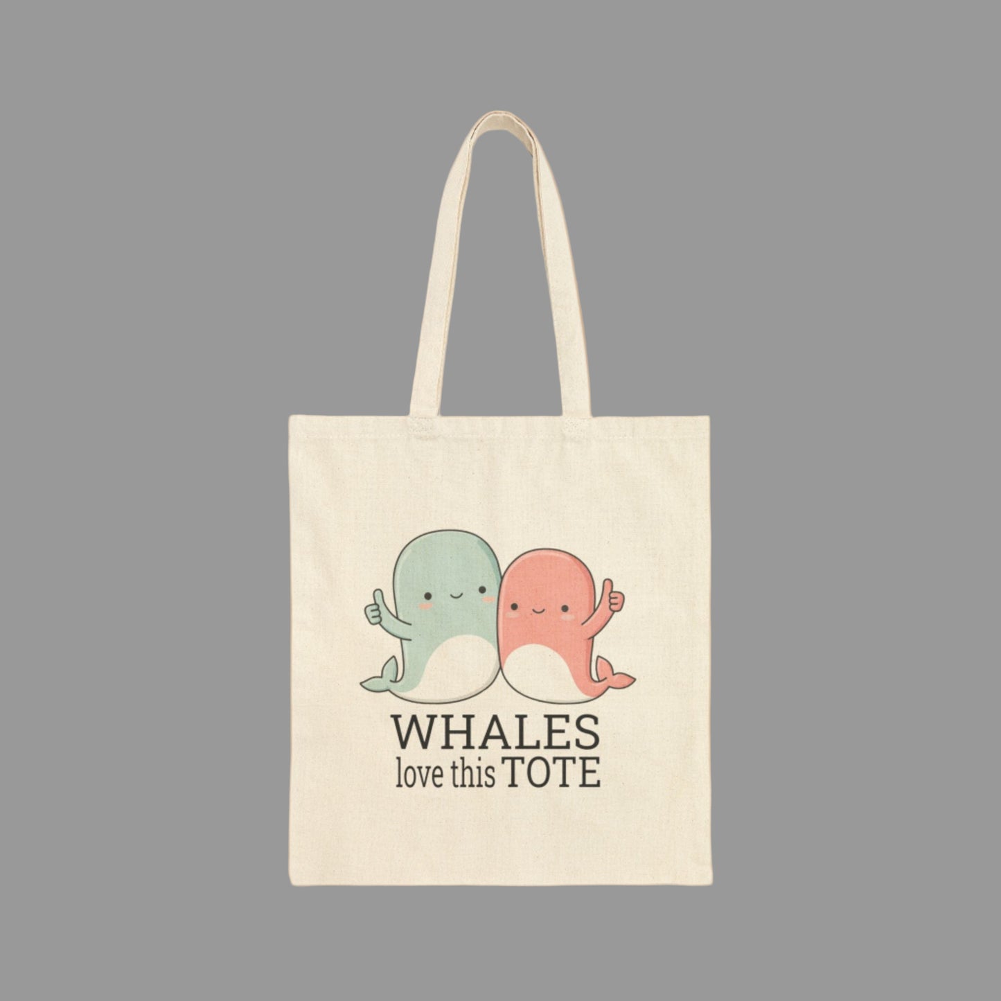 Tote bag with cartoon whales and text on a white background