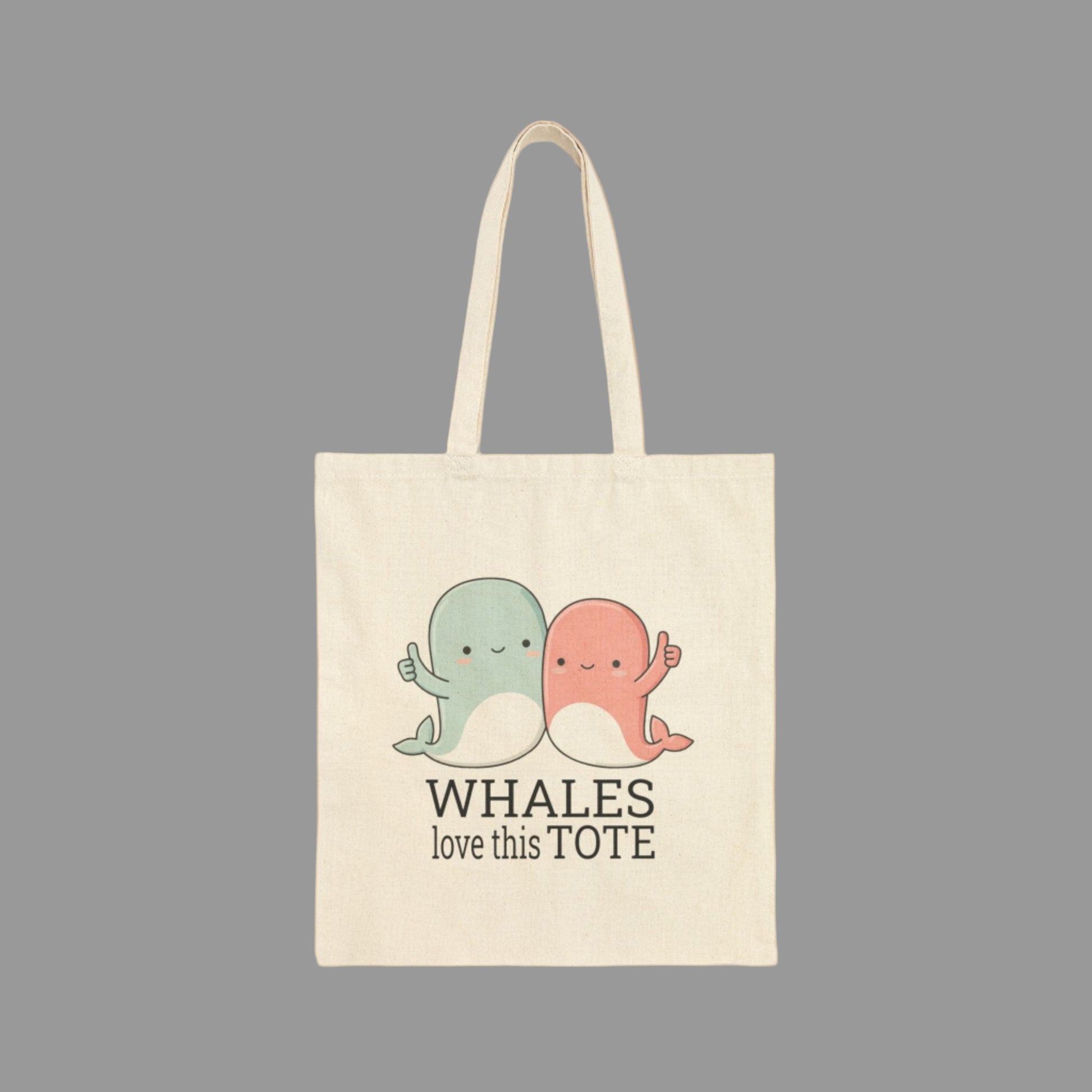 Tote bag with cartoon whales and text on a white background