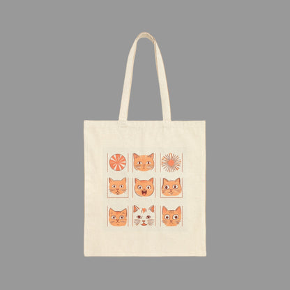 Beige tote bag with cat illustrations on a white background