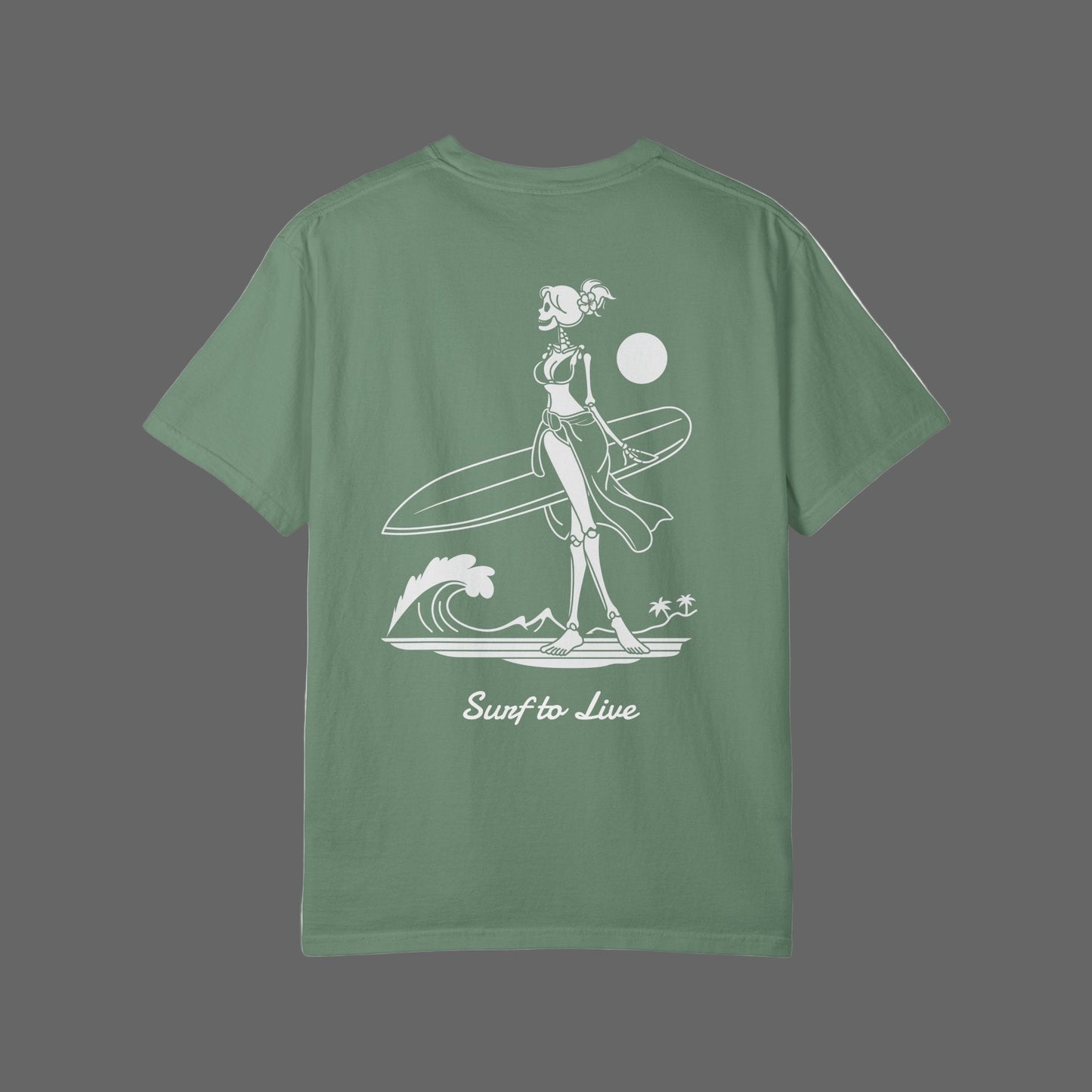 Green t-shirt with a white graphic design on the back featuring a skeleton surfer and text 'Surf to Live'.