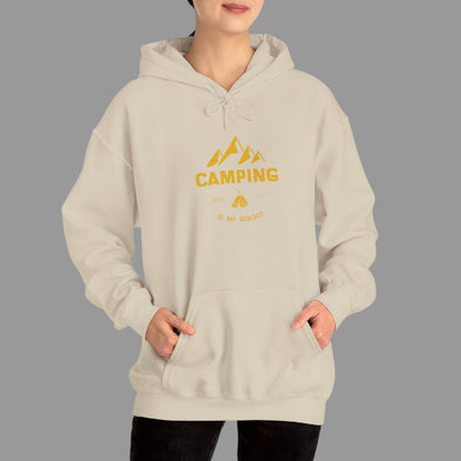 Person wearing a beige hoodie with 'Camping' text and mountain graphic on a white background