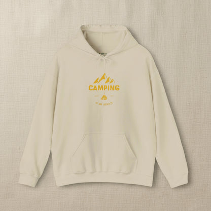 Beige hoodie with yellow 'Camping' graphic on a white background