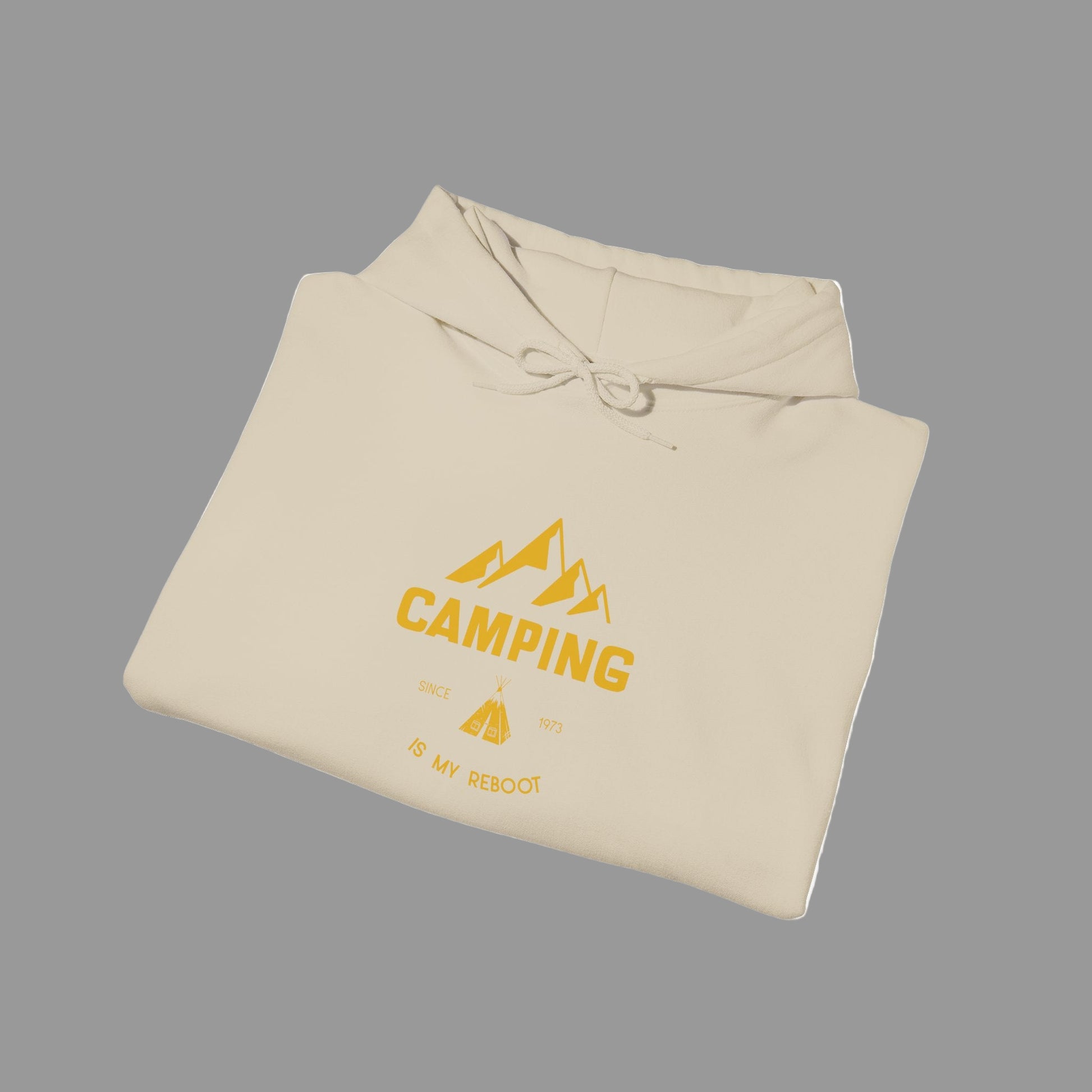 Beige hoodie with yellow 'Camping' graphic on a white background
