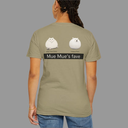 Person wearing a khaki t-shirt with cat illustrations and text on the back