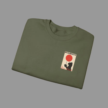 Folded green t-shirt with a small graphic on a white background