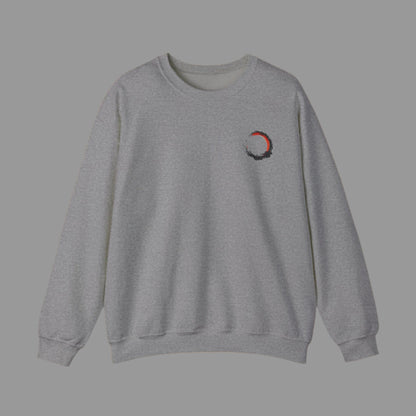 Gray sweatshirt with a small red and black design on a white background