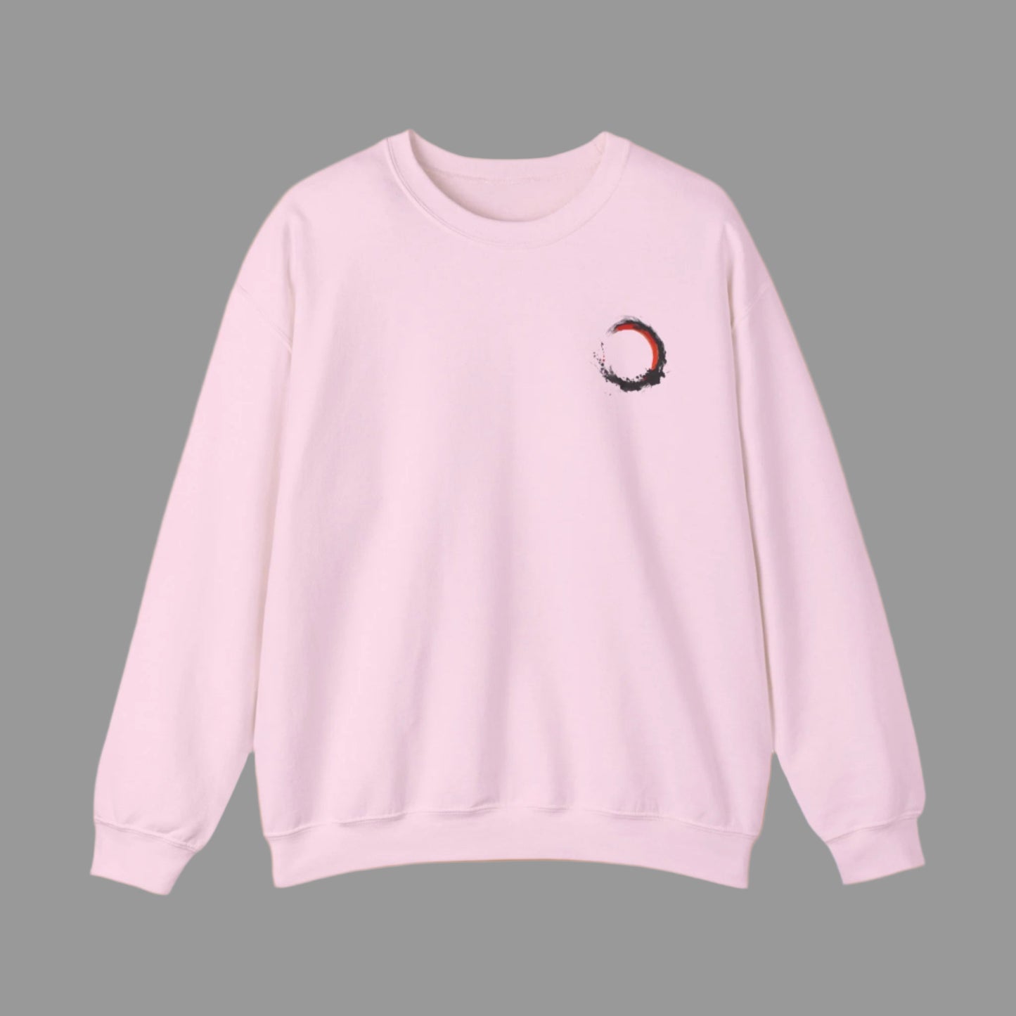 Pink sweatshirt with a small graphic on a white background