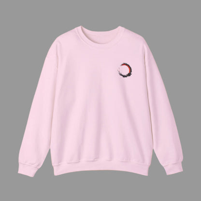 Pink sweatshirt with a small graphic on a white background