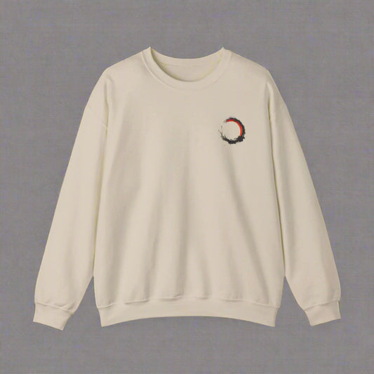 Beige sweatshirt with a small graphic on the chest against a white background