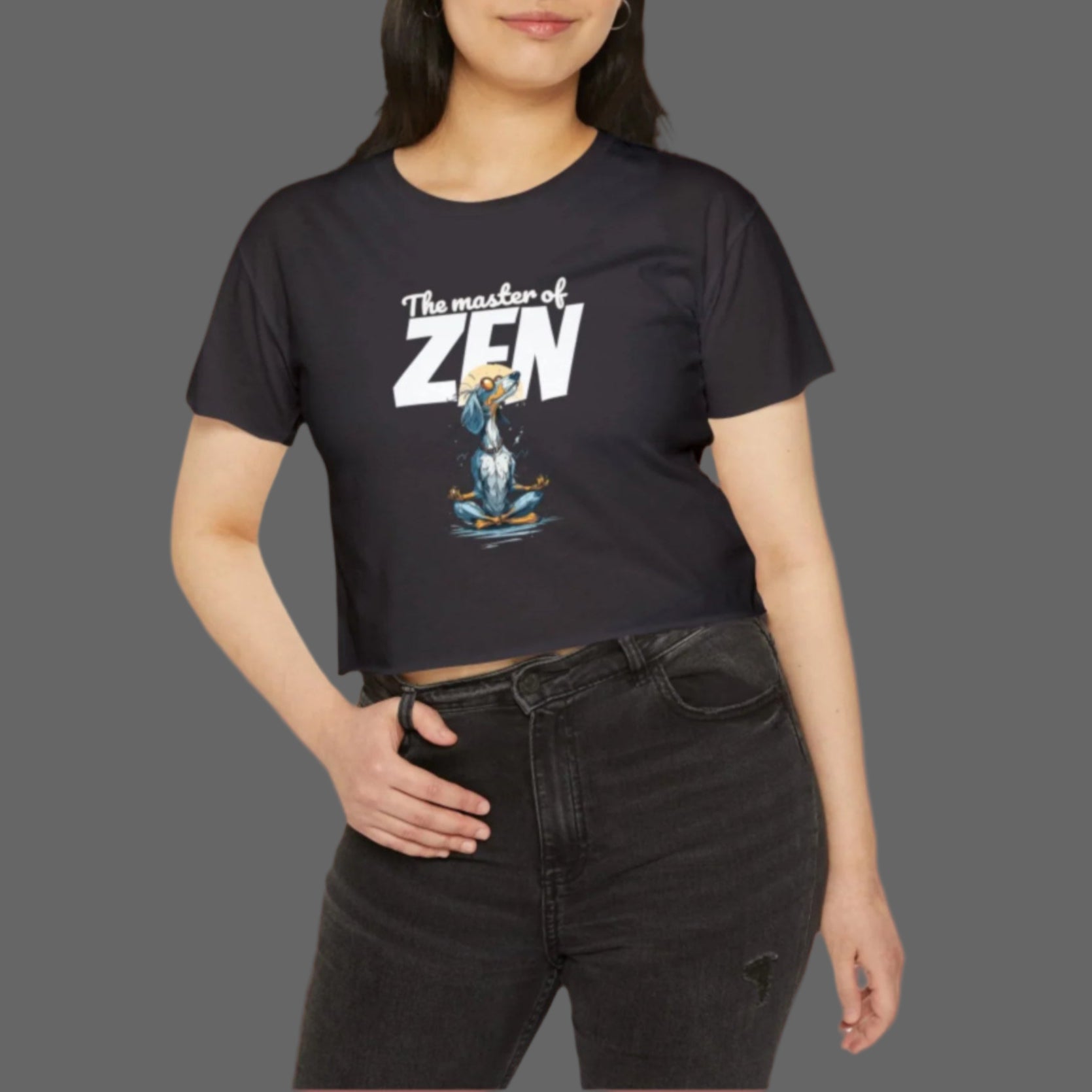 Woman wearing a black t-shirt with a graphic design and text on a white background