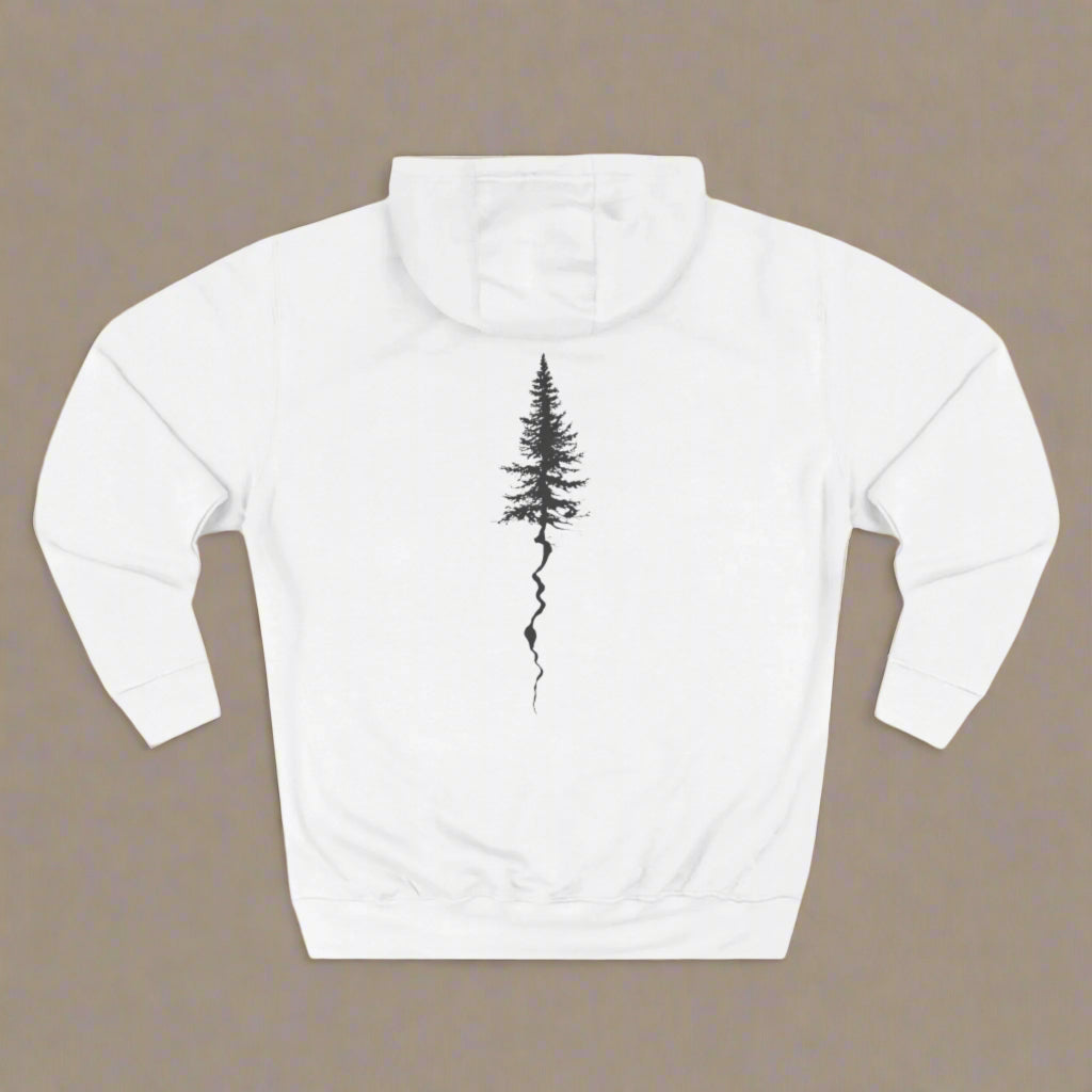A person wearing a white hoodie with a black tree graphic on the front.