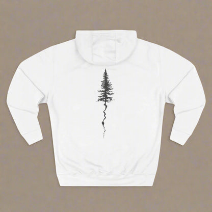 A person wearing a white hoodie with a black tree graphic on the front.