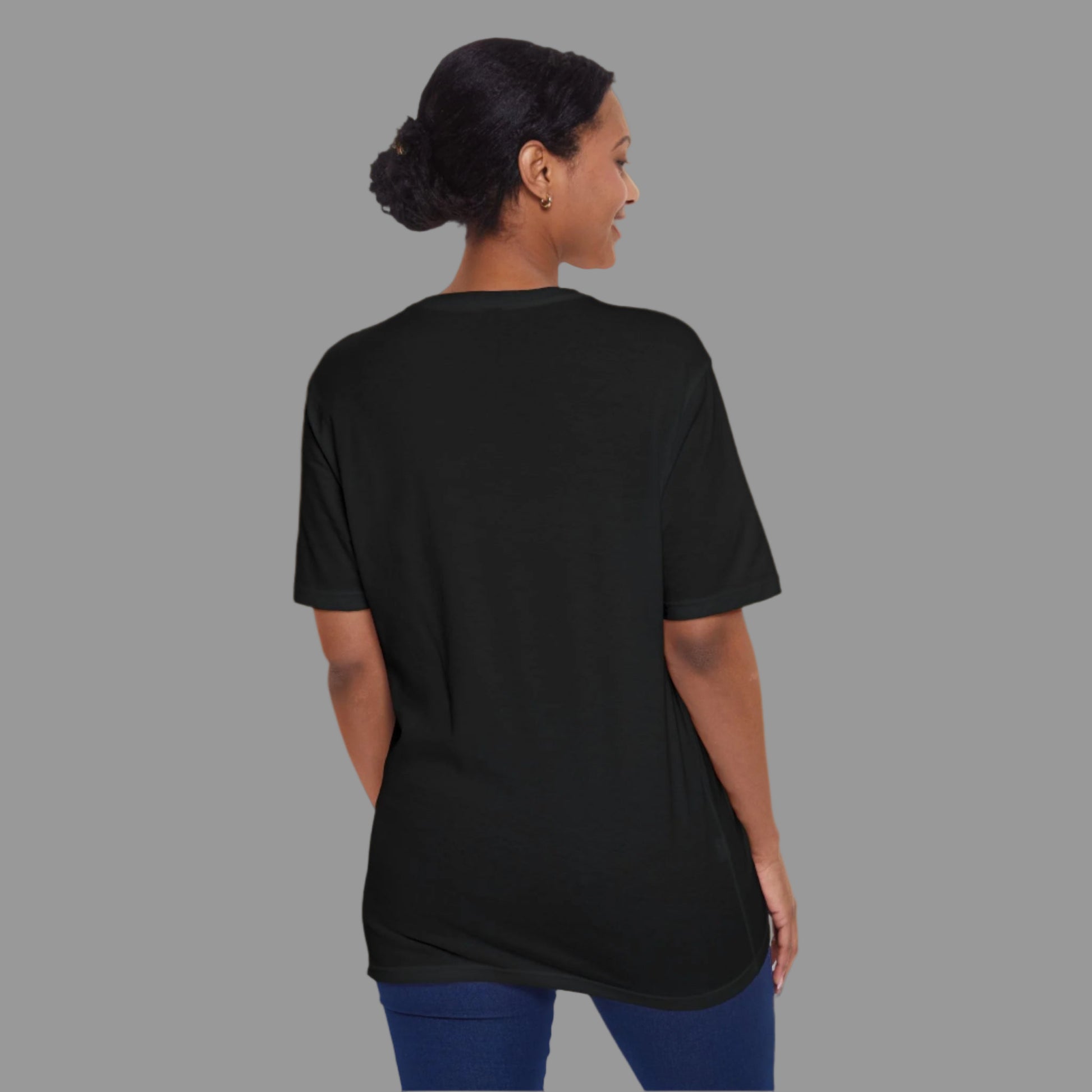 A woman wearing a black crew neck t-shirt with the text 'MOM MODE' on the front.