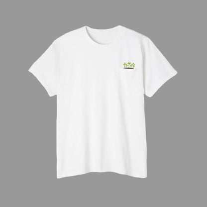 A person wearing a black crew neck t-shirt with a logo on the left chest pocket, paired with blue jeans.